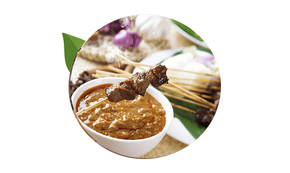 Grilled meat skewers with peanut dipping sauce